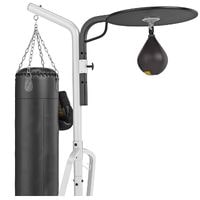 hanging  a punching bag in garage using a stand