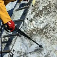 remove paint using a pressure washer