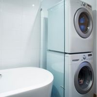 how far should a washer and dryer be from the wall?