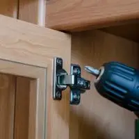 how to adjust old cabinet door hinges