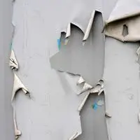 how to fix paint ripped off wall