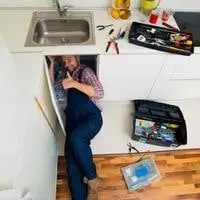 how to remove a kitchen sink that is glued down
