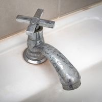 how to prevent calcium buildup on faucets