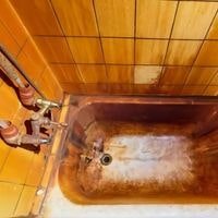 remove rust stains from fiberglass tub
