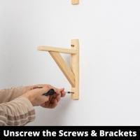 unscrew the screws & brackets
