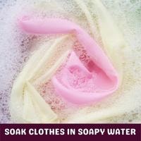 soak clothes in soapy water
