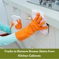 tracks to remove grease stains from kitchen cabinets