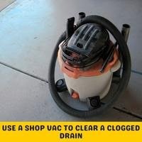 use a shop vac to clear a clogged drain